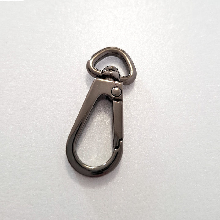 Gun metal Metallic carabiner on a white background