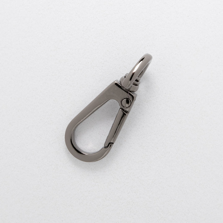 Metallic carabiner on a white background
