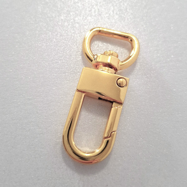 Gilt dog clip on white background