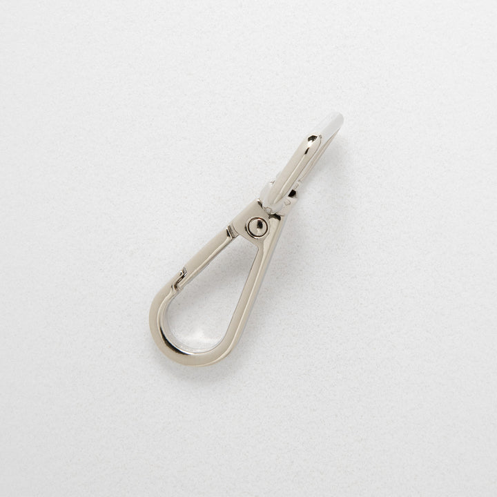 16.5mm nickel dog clip on white background