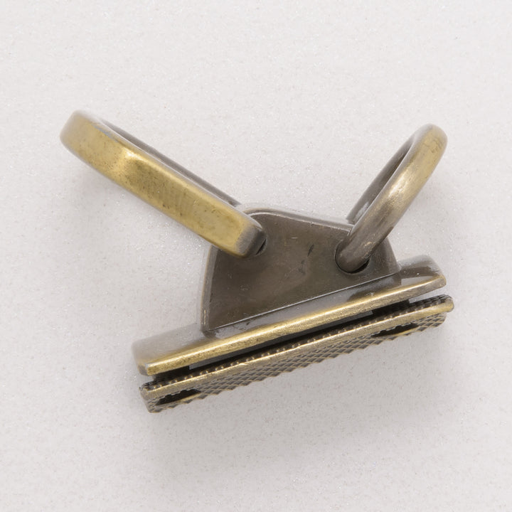 Side view of Antique brass double handle holder