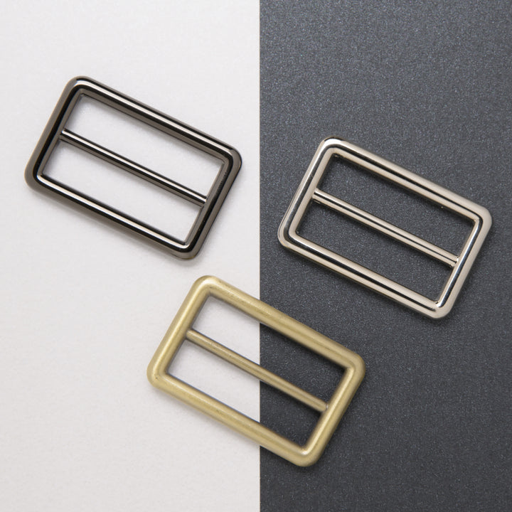 group of 3 x 38mm adjustable sliders in nickel, gun metals and antique brass