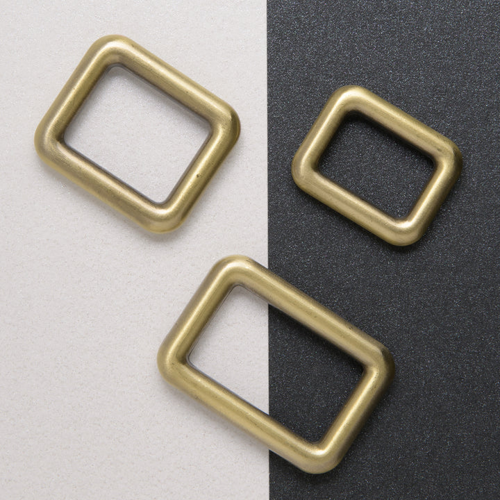 three antique brass handle holders, 16mm, 20mm and 25mm