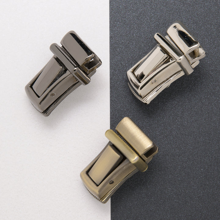 20.5mm tuck lock in nickel, gun metal and antique brass